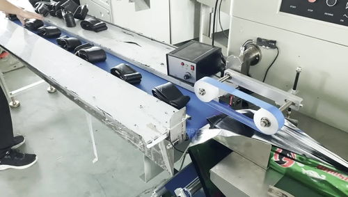 輪胎內胎包裝機打圓孔排氣汽車內胎自動套袋封口機摩托車輪胎內胎自動打包機自行車內胎枕式包裝機械